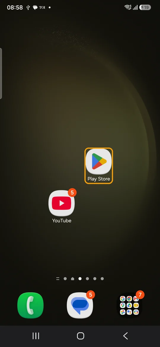 An Android home screen with the Google Play Store icon highlighted